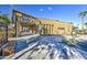 Attractive community clubhouse with modern architectural details and landscaping at 10240 E Supernova Dr, Mesa, AZ 85212
