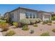 Landscaped front yard with desert plants and shrubs in a desert rock landscape at 10240 E Supernova Dr, Mesa, AZ 85212