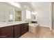 Large primary bathroom with dual vanities, soaking tub, and a walk-in shower at 10240 E Supernova Dr, Mesa, AZ 85212