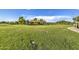 Expansive green park area with a unique stage structure and lush landscaping at 10240 E Supernova Dr, Mesa, AZ 85212
