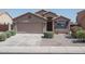 Charming single-story home with a well-manicured lawn and inviting curb appeal at 10618 W Pima St, Tolleson, AZ 85353