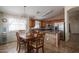 Spacious kitchen with stainless steel appliances and a dining table at 10618 W Pima St, Tolleson, AZ 85353