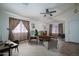 Staged living room with comfortable seating, providing an inviting space at 10618 W Pima St, Tolleson, AZ 85353