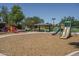 Community playground, featuring various play structures and shaded areas for Gathering fun at 10618 W Pima St, Tolleson, AZ 85353