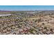 Property outlined in neighborhood with desert and industrial scenery at 16264 W Pioneer St, Goodyear, AZ 85338