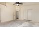 Bedroom featuring a ceiling fan and closet, offering comfort and storage at 16264 W Pioneer St, Goodyear, AZ 85338