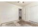 Bedroom featuring a closet, electrical outlets, and doorway at 16264 W Pioneer St, Goodyear, AZ 85338