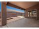 Covered patio with access to a spacious backyard, perfect for outdoor relaxation at 16264 W Pioneer St, Goodyear, AZ 85338