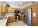 Well-equipped kitchen with stainless steel appliances and ample cabinet space at 17449 N Fairway Dr, Surprise, AZ 85374