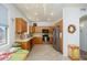 Bright and functional kitchen featuring modern appliances and a breakfast area at 17449 N Fairway Dr, Surprise, AZ 85374