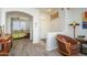 Warm and inviting living area with an open layout flowing into the bedroom at 17449 N Fairway Dr, Surprise, AZ 85374
