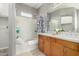 Spacious bathroom features a double sink vanity, bathtub, and ample storage at 1920 E Bell Rd # 1165, Phoenix, AZ 85022
