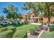 A neighborhood common area with a green lawn, a picnic pavilion, and barbecue grills at 1920 E Bell Rd # 1165, Phoenix, AZ 85022