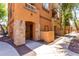 Attractive townhome exterior with stone accents and a welcoming entrance at 1920 E Bell Rd # 1165, Phoenix, AZ 85022