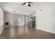 Bright, open living space featuring hardwood floors, modern lighting, and neutral tones at 1920 E Bell Rd # 1165, Phoenix, AZ 85022