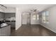 Spacious living area featuring hardwood floors, contemporary ceiling fan and abundant light at 1920 E Bell Rd # 1165, Phoenix, AZ 85022