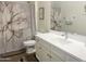 Bathroom featuring a flower-patterned shower curtain, white vanity, and a modern faucet at 20952 E Via Del Sol --, Queen Creek, AZ 85142
