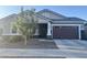 Attractive single-story home featuring a two-car garage and well-maintained front landscaping at 20952 E Via Del Sol --, Queen Creek, AZ 85142