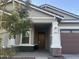Charming single-story home featuring a covered porch and meticulously landscaped front yard at 20952 E Via Del Sol --, Queen Creek, AZ 85142