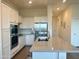 Bright kitchen with a center island, stainless appliances, and plenty of cabinet storage at 20952 E Via Del Sol --, Queen Creek, AZ 85142