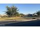 Scenic view of the community parkway, showcasing the beautiful green space in a residential area at 20952 E Via Del Sol --, Queen Creek, AZ 85142