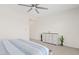 Serene bedroom with a light-colored dresser and a bright, airy feel at 23038 E Twilight Dr, Queen Creek, AZ 85142
