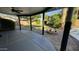 Expansive backyard with lush lawn, a cozy fire pit, covered patio, and refreshing pool at 3109 E Cholla St, Phoenix, AZ 85028