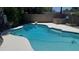 Sparkling blue swimming pool featuring diving board and basketball hoop for Gathering fun at 3109 E Cholla St, Phoenix, AZ 85028