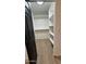 Walk-in closet features shelving with a wood floor at 3109 E Cholla St, Phoenix, AZ 85028