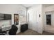 Office space with a laundry basket, a large Spiderman poster, and lots of natural light at 35816 W San Ildefanso Ave, Maricopa, AZ 85138