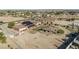 Desert estate featuring pool, putting green, solar, and desert landscaping at 3718 N Briere Ct, Buckeye, AZ 85396
