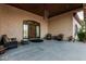 Welcoming home entrance with ample seating and an ornate chandelier overhead at 3718 N Briere Ct, Buckeye, AZ 85396