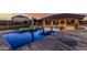 Sparkling backyard pool and outdoor kitchen, perfect for entertaining at 3718 N Briere Ct, Buckeye, AZ 85396