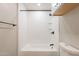 Bathroom featuring white tiles and a shower at 4001 E Apollo Rd, Phoenix, AZ 85042
