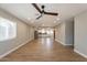 Expansive living room featuring recessed lighting, tile floors and an open layout to the kitchen at 4001 E Apollo Rd, Phoenix, AZ 85042
