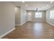 Bright living area with tiled floors, recessed lighting, a ceiling fan and a freshly painted gray walls at 4001 E Apollo Rd, Phoenix, AZ 85042