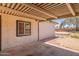 Covered patio with an attached garage, offering convenient access and shade at 4001 E Apollo Rd, Phoenix, AZ 85042