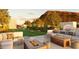 Entertaining rooftop with fire pits, lawn games, desert landscaping, and lounge seating at 4849 N Camelback Ridge Rd # B308, Scottsdale, AZ 85251