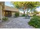 This charming property boasts desert landscaping, a fountain, and mature trees at 4856 E Cheryl Dr, Paradise Valley, AZ 85253