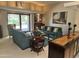 Inviting living area featuring comfortable seating and sliding glass doors providing access to the outdoors at 4856 E Cheryl Dr, Paradise Valley, AZ 85253