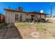 Spacious backyard featuring a covered patio area, perfect for outdoor dining and relaxation at 5101 W Purdue Ave, Glendale, AZ 85302