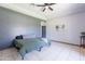 Primary bedroom with a ceiling fan and a neutral color palette at 5127 W Dobbins Rd, Laveen, AZ 85339