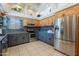 Modern kitchen featuring stainless steel appliances and ample counter space at 5127 W Dobbins Rd, Laveen, AZ 85339