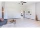 Spacious living room with tile floors and a light gray color scheme at 5127 W Dobbins Rd, Laveen, AZ 85339