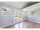 Bright shed interior with French doors, hardwood floors and lots of natural light, perfect for home office at 5127 W Dobbins Rd, Laveen, AZ 85339