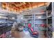 Storage area with shelving, tools, and equipment at 5127 W Dobbins Rd, Laveen, AZ 85339