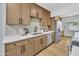Well-appointed kitchen with stainless steel appliances, sleek countertops, and modern cabinetry for a clean aesthetic at 6233 E Pinchot Ave, Scottsdale, AZ 85251