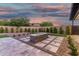Beautiful backyard with pavers, gravel and a stone gas fire pit, perfect for entertaining at 6401 E Larkspur Dr, Scottsdale, AZ 85254