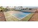 Well-maintained backyard basketball court with clear markings offers recreation and fun for active homeowners at 6401 E Larkspur Dr, Scottsdale, AZ 85254
