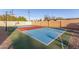 Well-maintained backyard basketball court offers recreation and fun for active homeowners at 6401 E Larkspur Dr, Scottsdale, AZ 85254